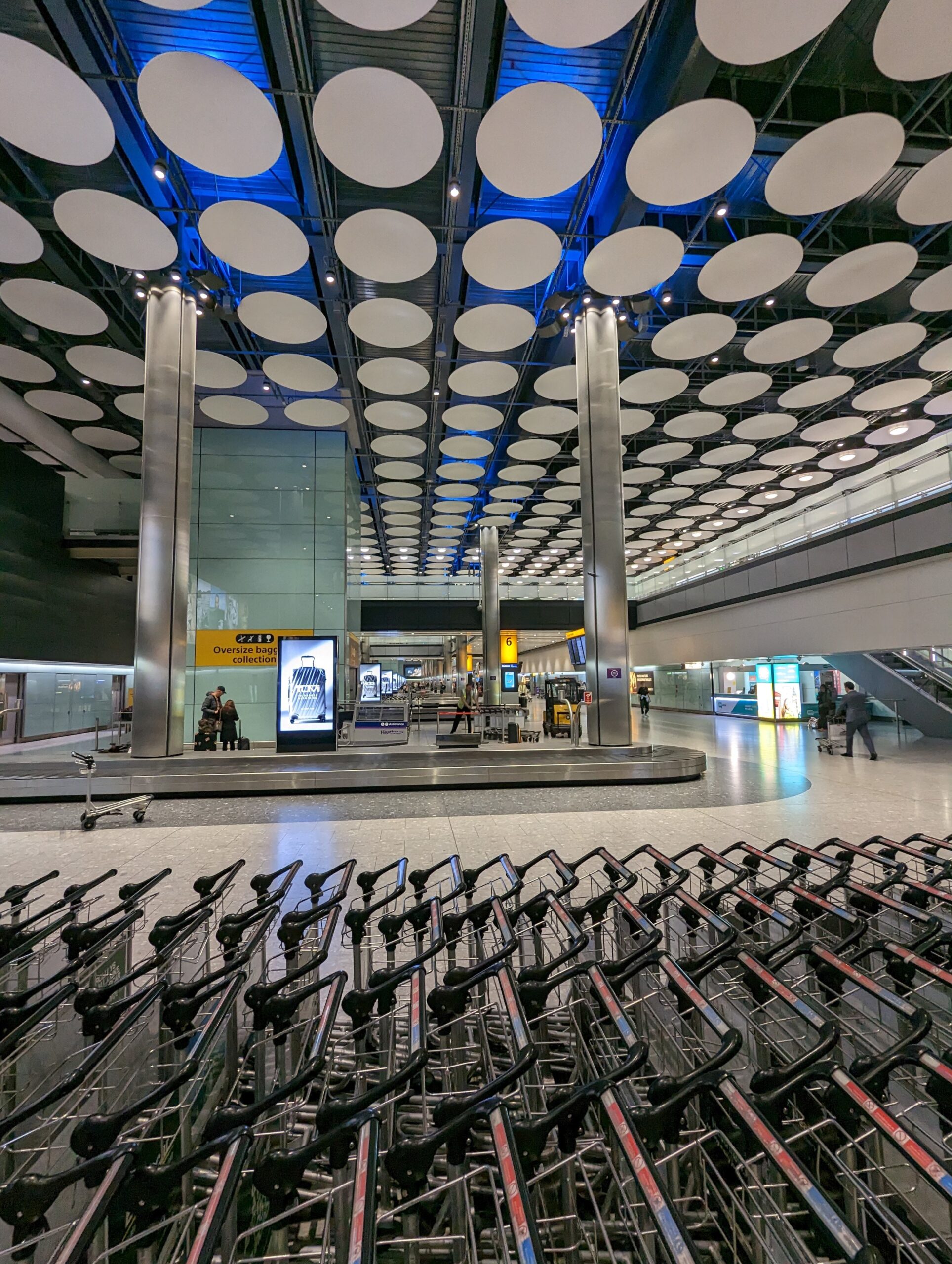 A European airport baggage claim area.