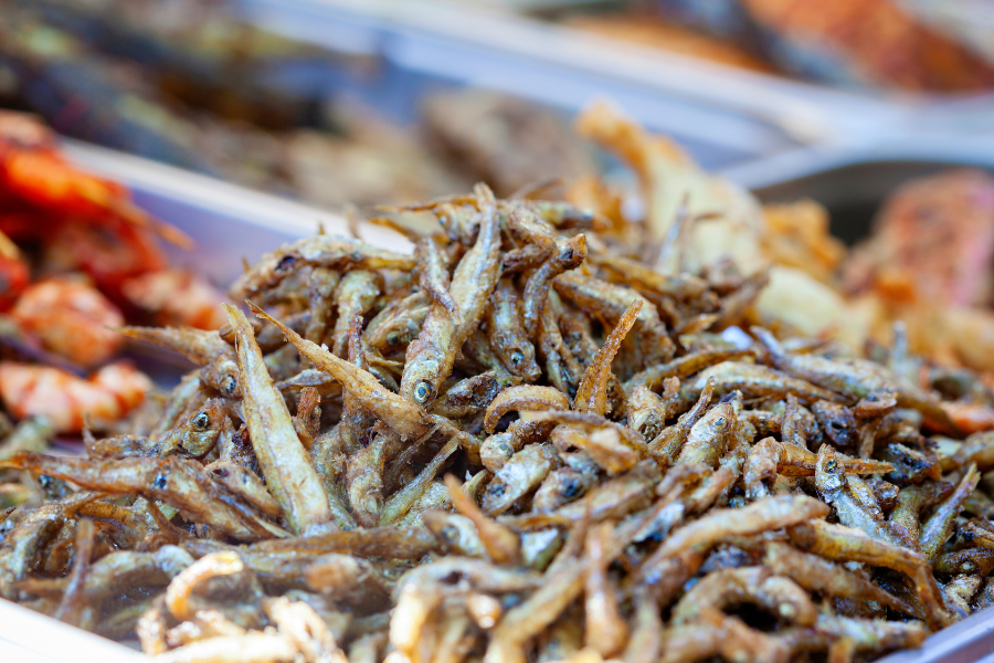 A plate of crispy fried anchovies.