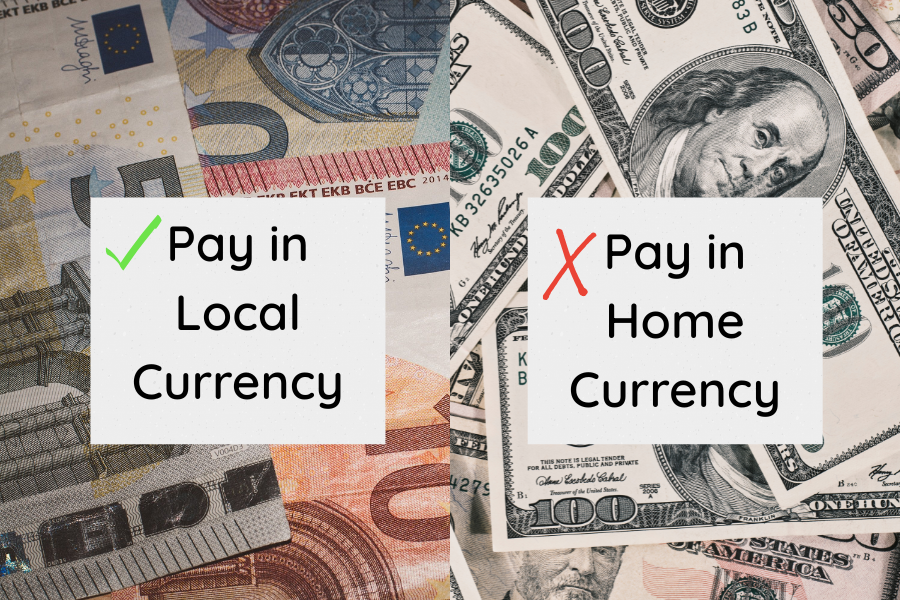 Graphic showing ‘Pay in local currency’ over euros with a green check mark and ‘Pay in home currency’ over US dollars with a red X, illustrating the cost difference when paying by card abroad.