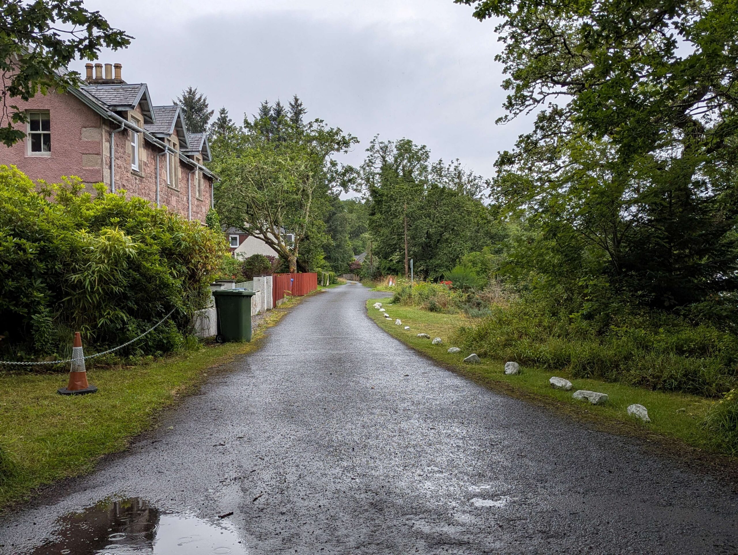 A single-lane road with a small passing place on the Isle of Skye in Scotland.